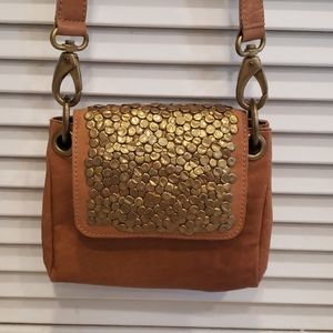 Monserat de Lucca leather and brass purse